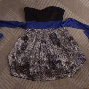 Strapless mini with tie waist and ruffled skirt